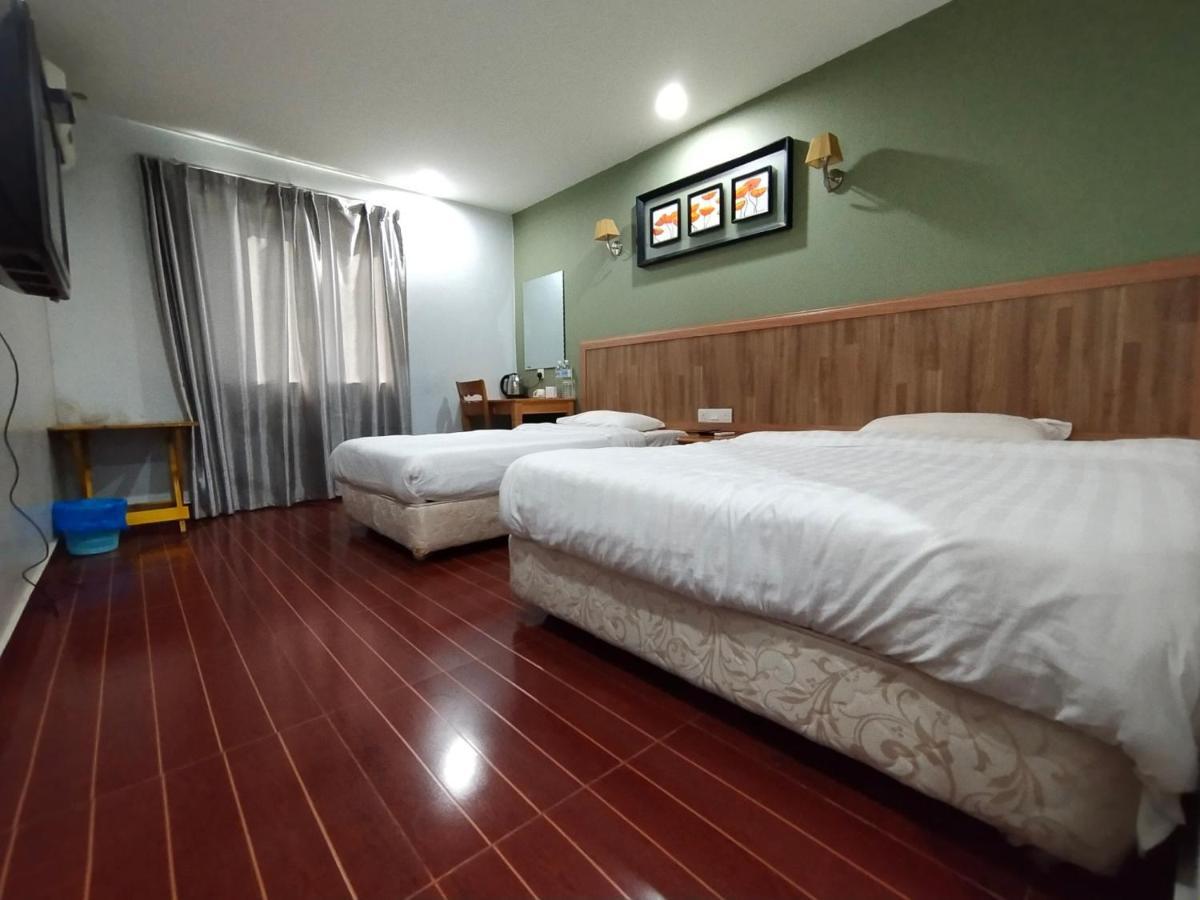 Oyo 90248 Kapitan Inn 民都鲁 外观 照片