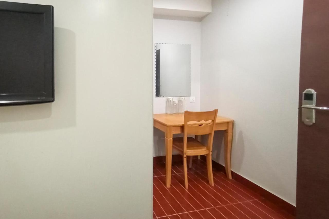 Oyo 90248 Kapitan Inn 民都鲁 外观 照片